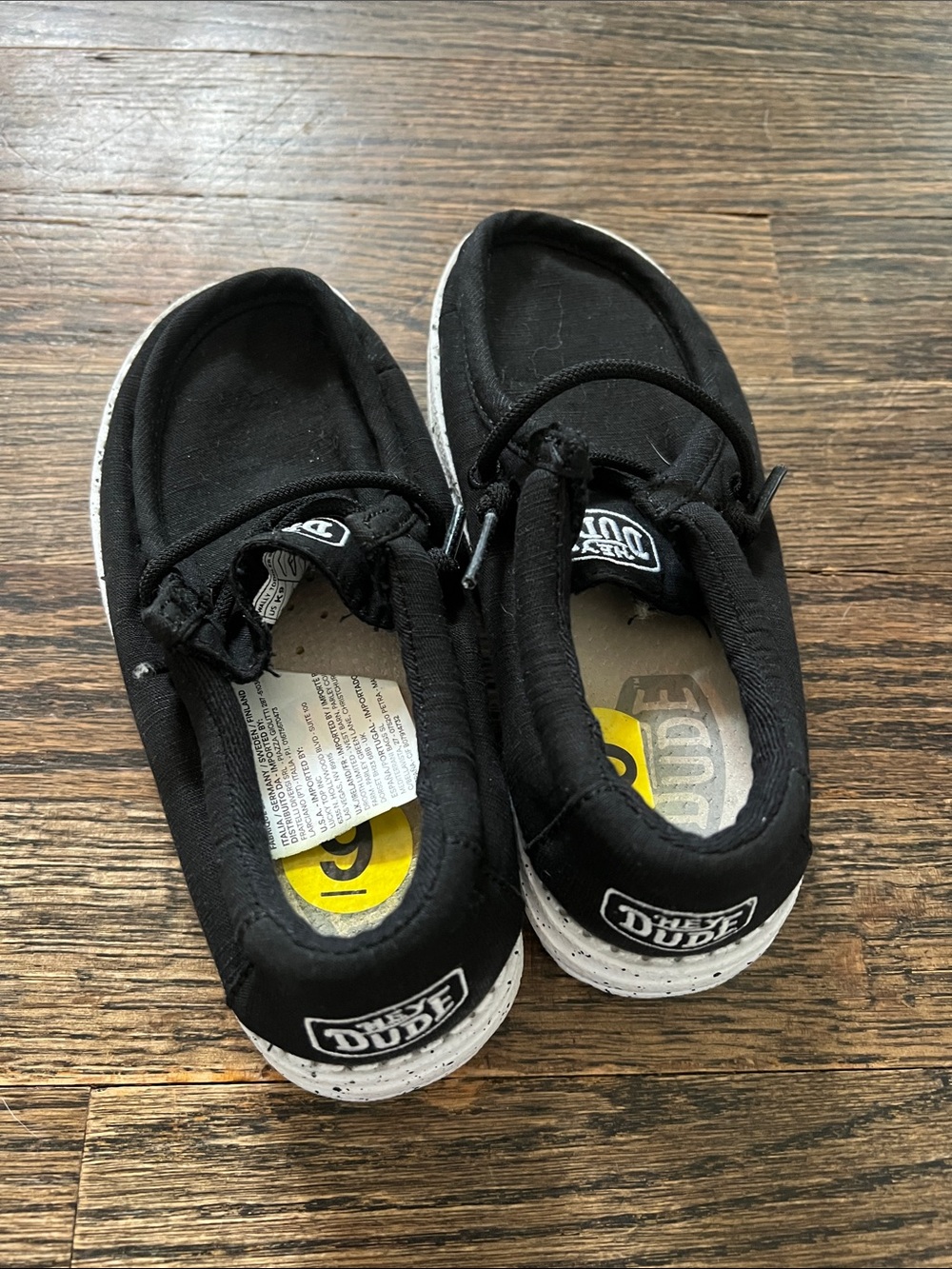 Hey Dude Kids Black Slip-On Sneakers with White Sole